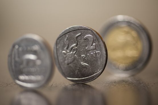 Rand firms as dollar retreats ahead of US inflation data